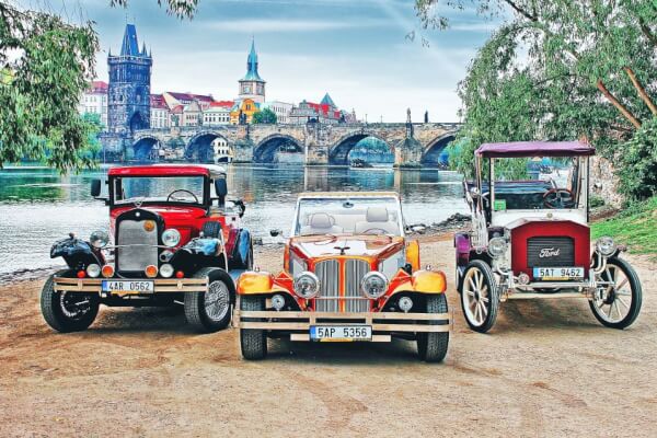 Fairytale Karlstejn Castle in Retro-Style Car