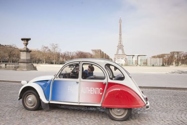 Feel the romance of Paris in a vintage convertible Citroën 2CV.