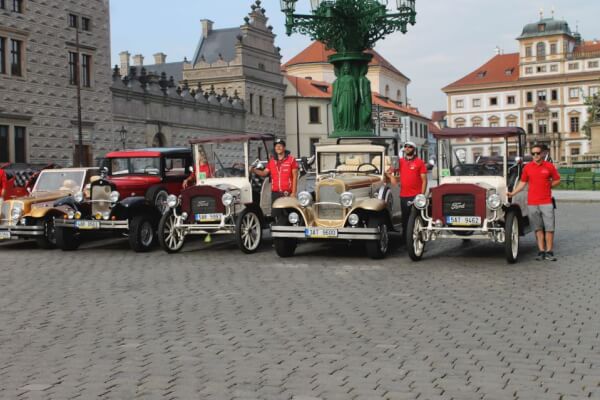 Enjoy a unique vintage car tour in Prague, and discover the most famous places in the city.